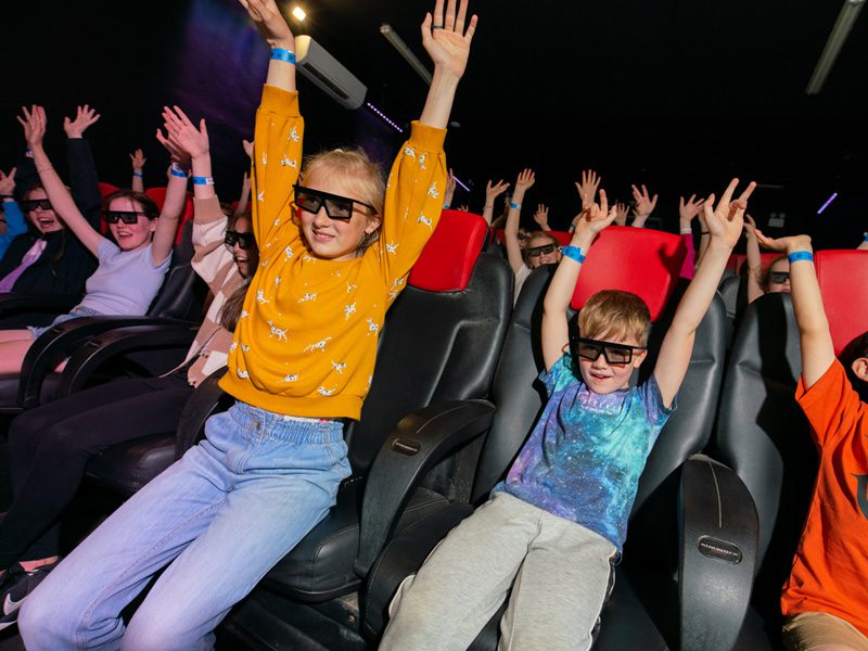 room of children waving in 5d cinema emerald park