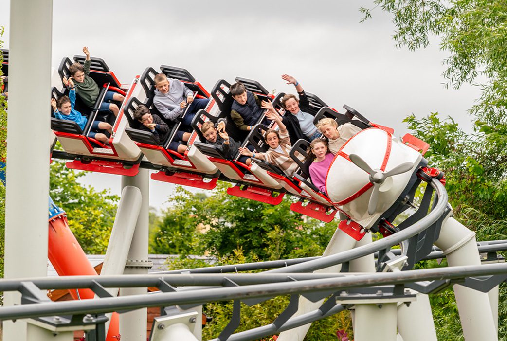 children in the middle of a theme park ride at emerald park