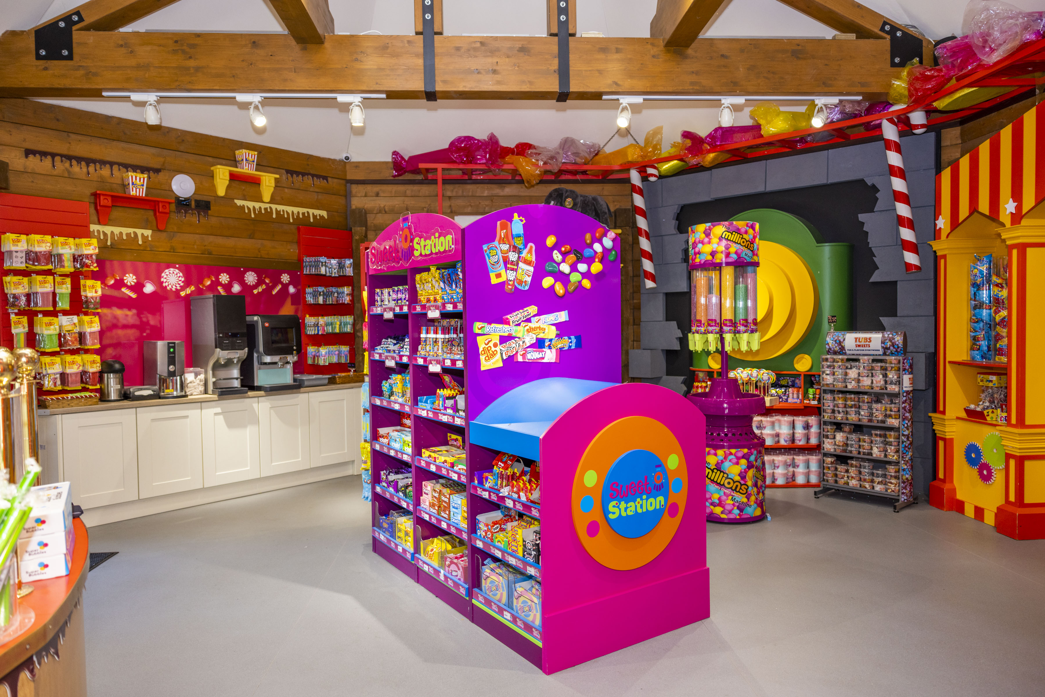 a colourful sweet shop filled with different treats