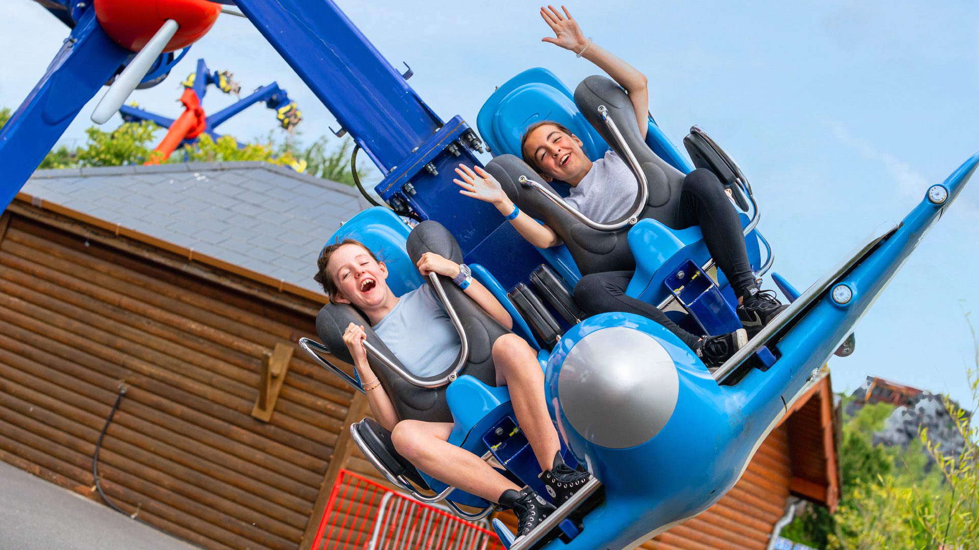 close up of two children on air race ride in emerald park