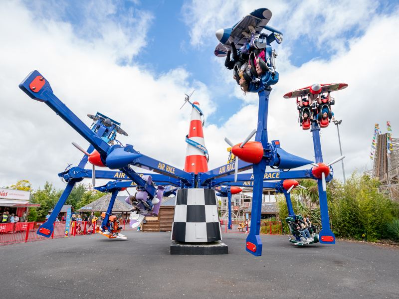 A wide shot of the air racer ride in action