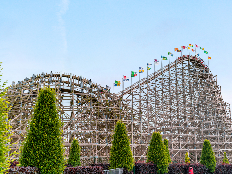 a wide view of the Cu Chulainn rollercoaster showing a number of flags on the slope
