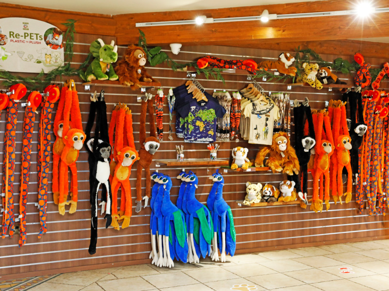 stuffed animals on wall at gift shop