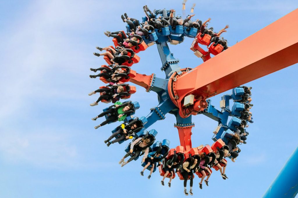 the rotator ride at emerald park with children upside down