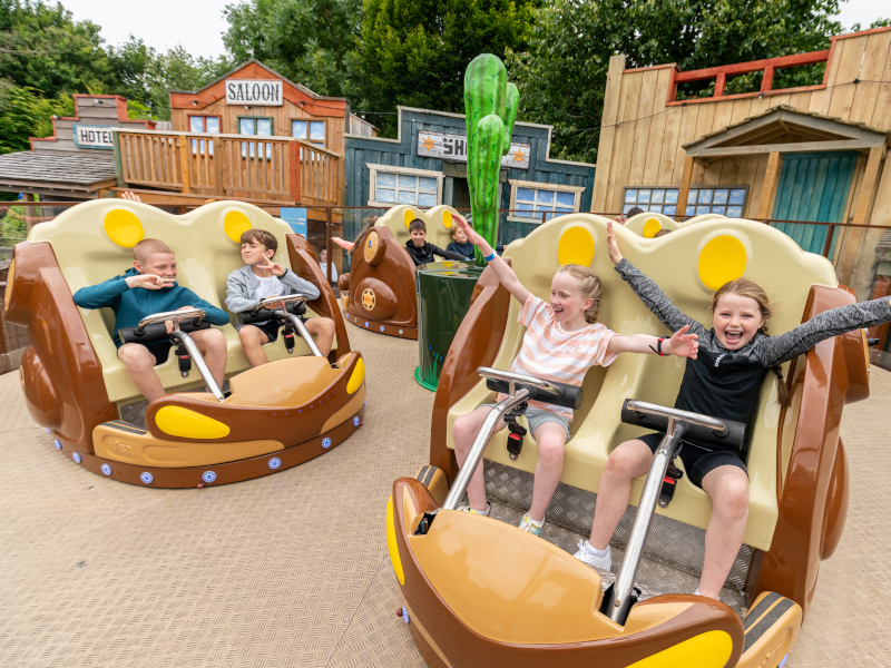 Children happily riding the Sherriff Shuffle