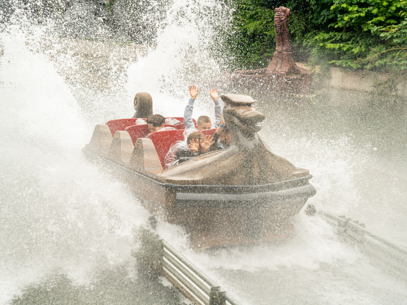 Children on board the viking voyage boat creating a big splash