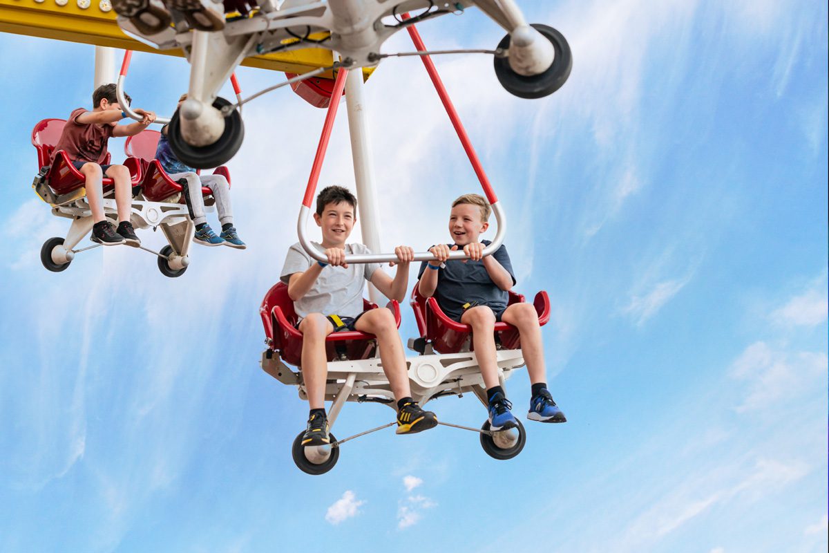 Children riding the Windstar at Emerald Park