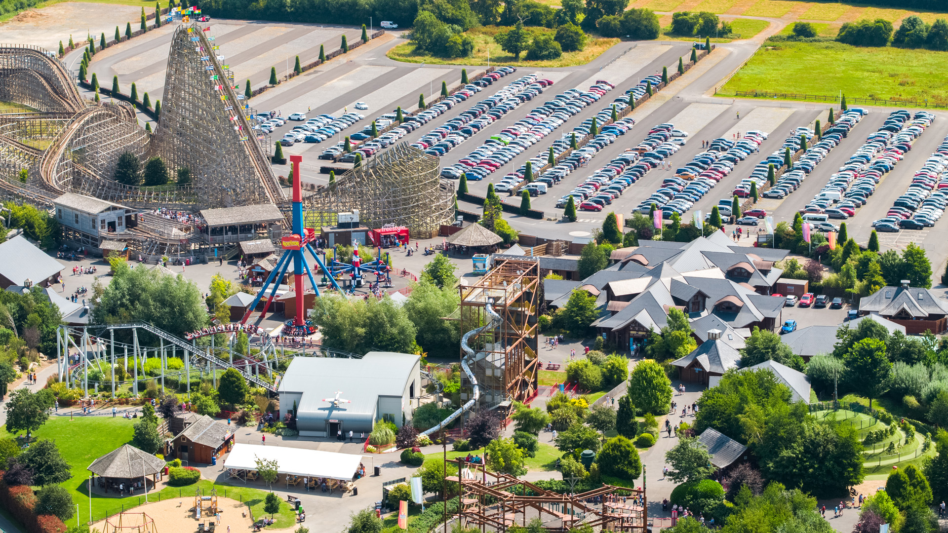 aerial view of emerald park theme park with attractions and carpark spaces