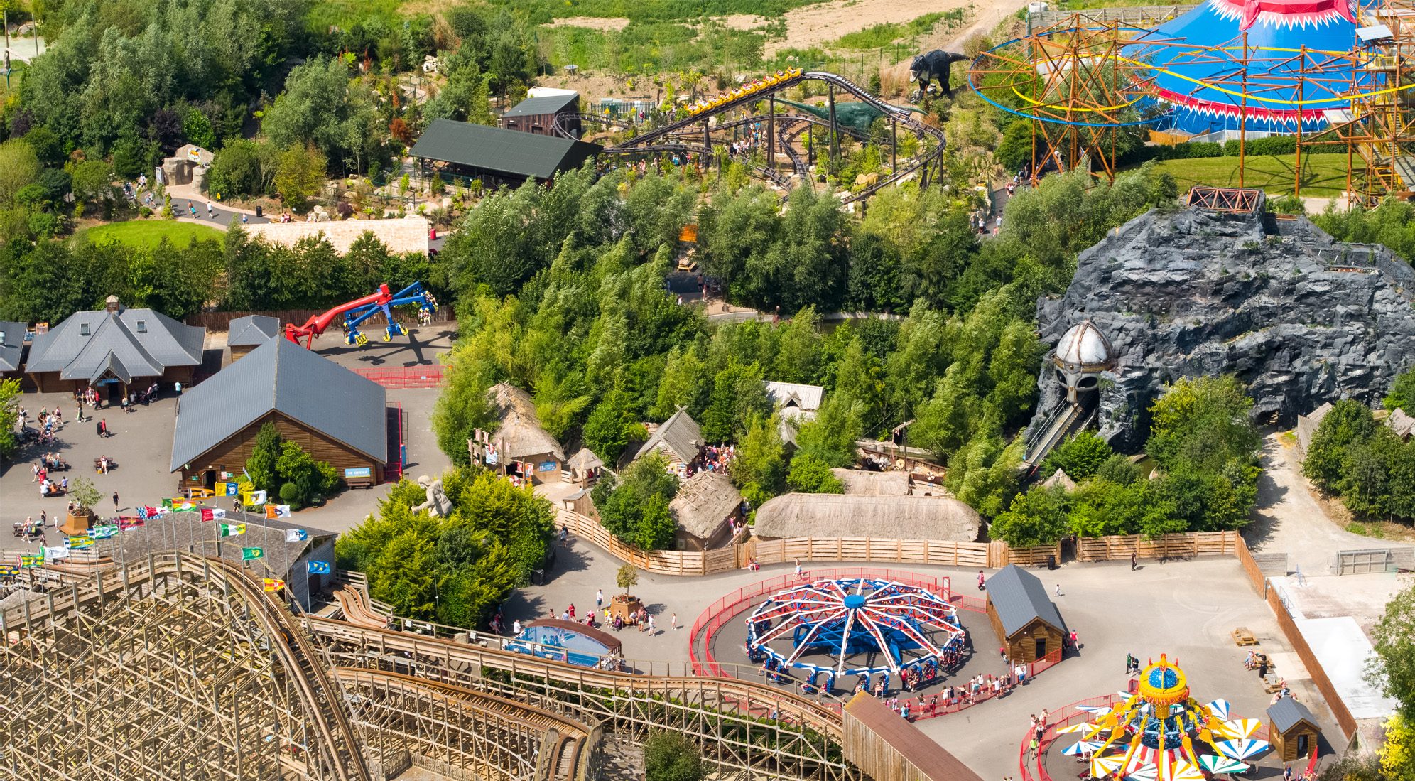 aerial view of emerald park rides, trees and buildings