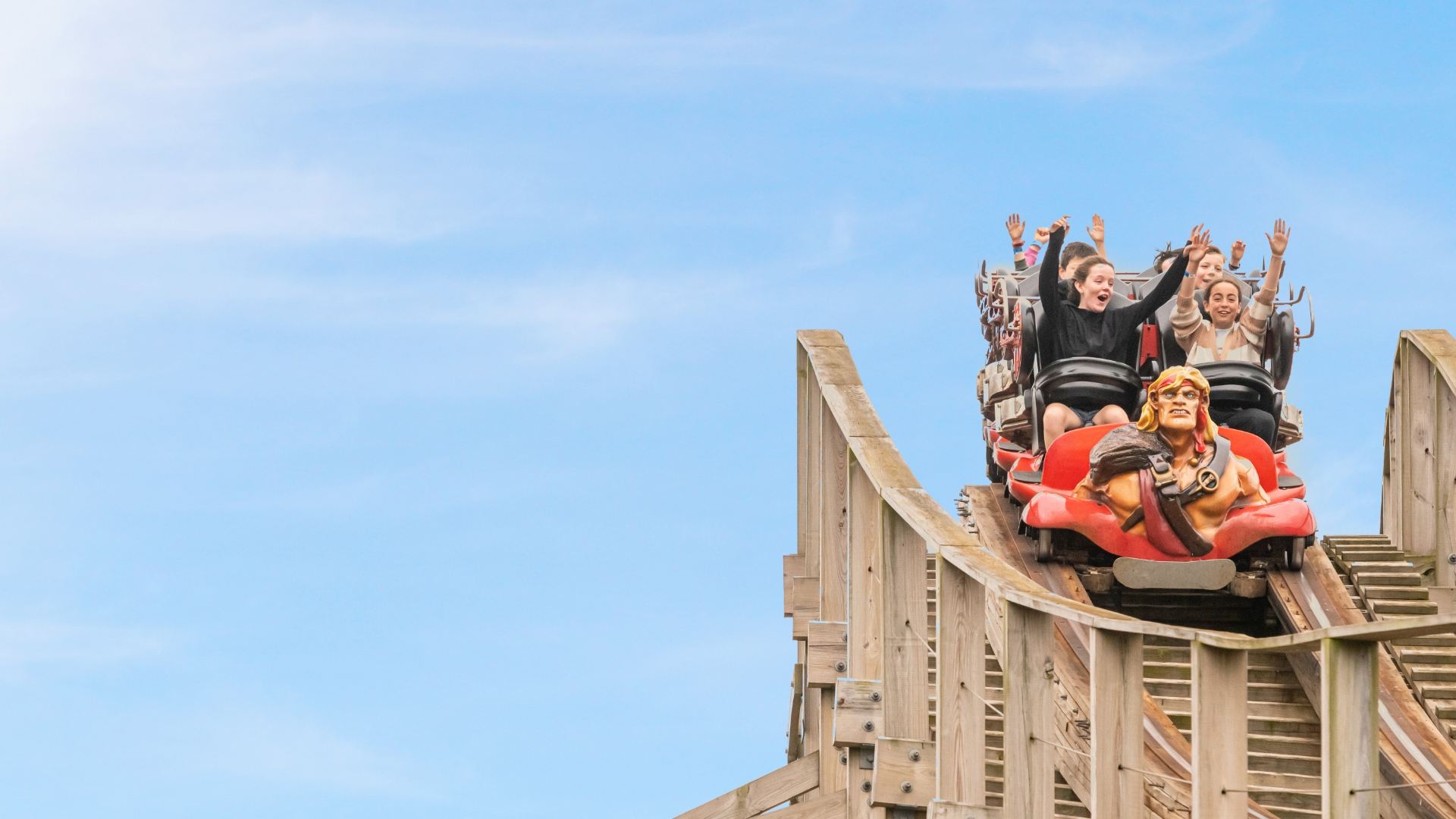 With their arms up, children are having fun while riding the Cu Chulainn at emerald park