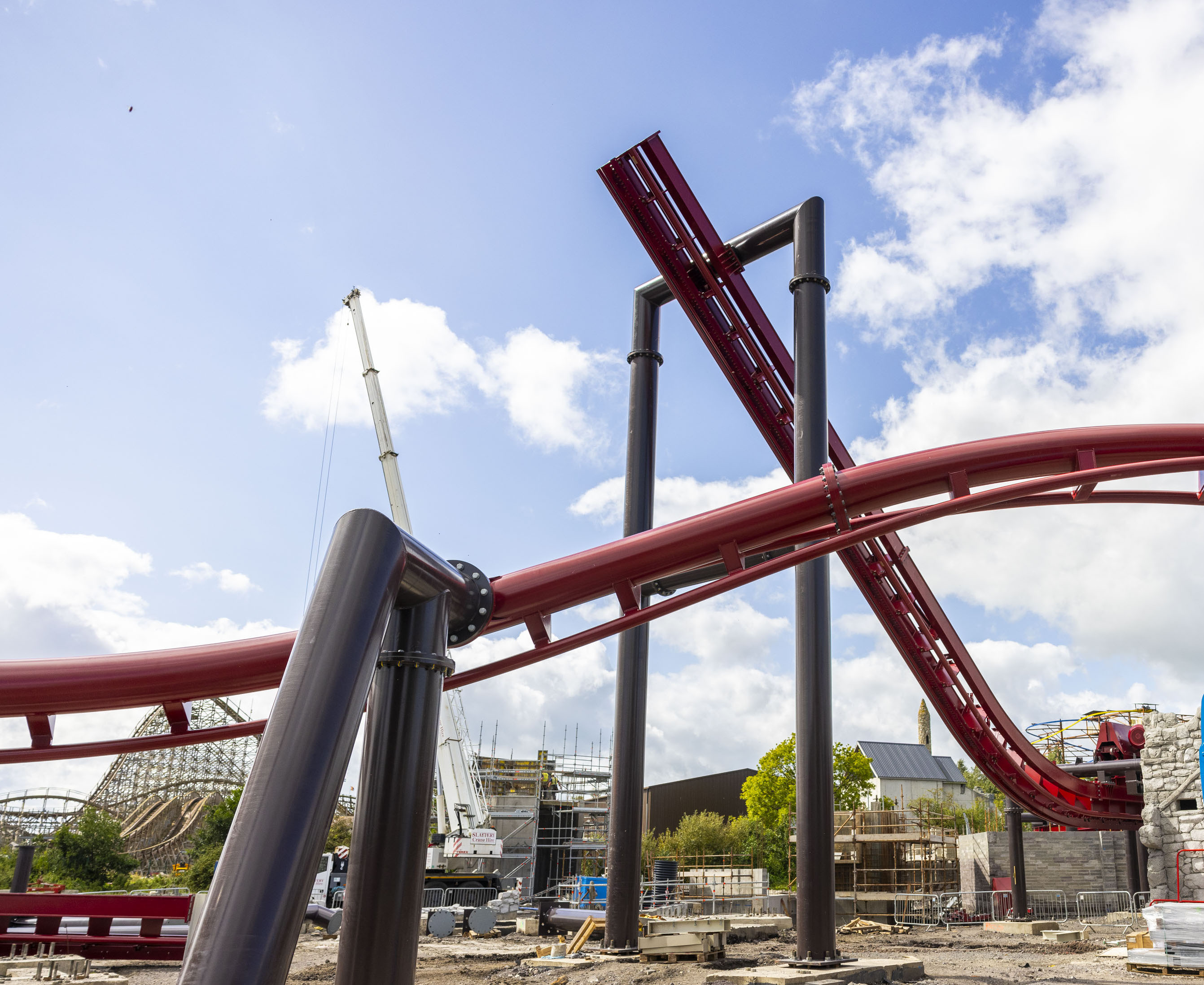 a red rollercoaster track being built