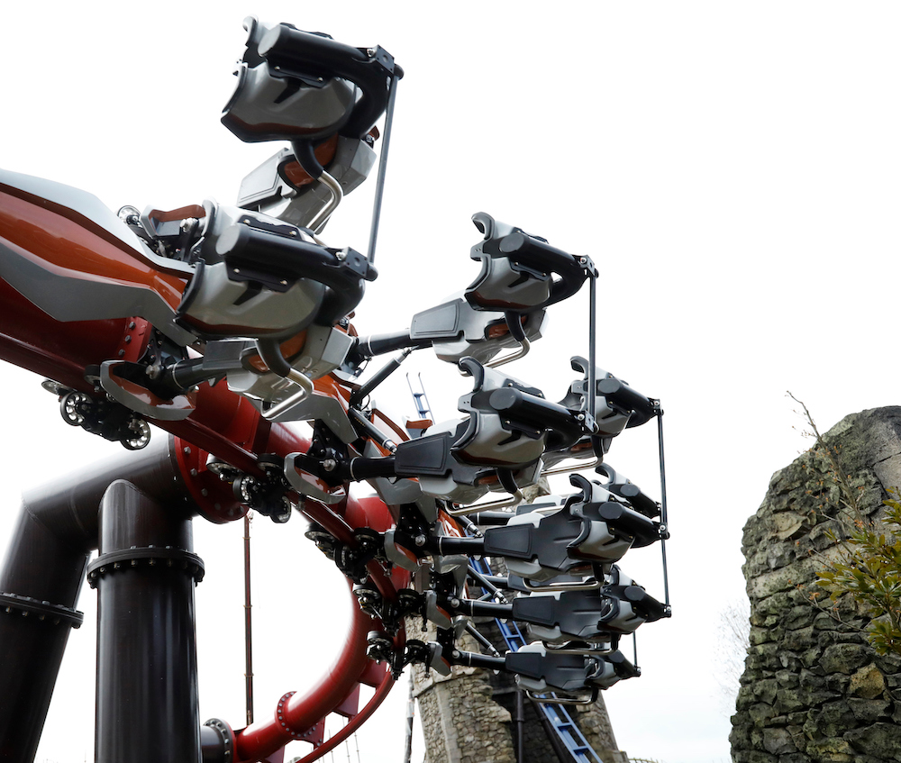 A red rollercoaster in action at Emerald Park